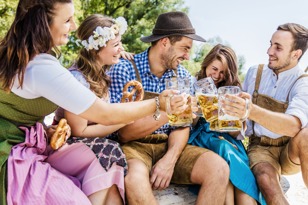 Young adults indulge in the festivities during the Leavenworth Oktoberfest.
