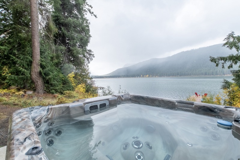 Leavenworth Fishing Cabins on the Water: A view of the lake from the outdoor hot tub at Alpine Lake Escape on Fish Lake.